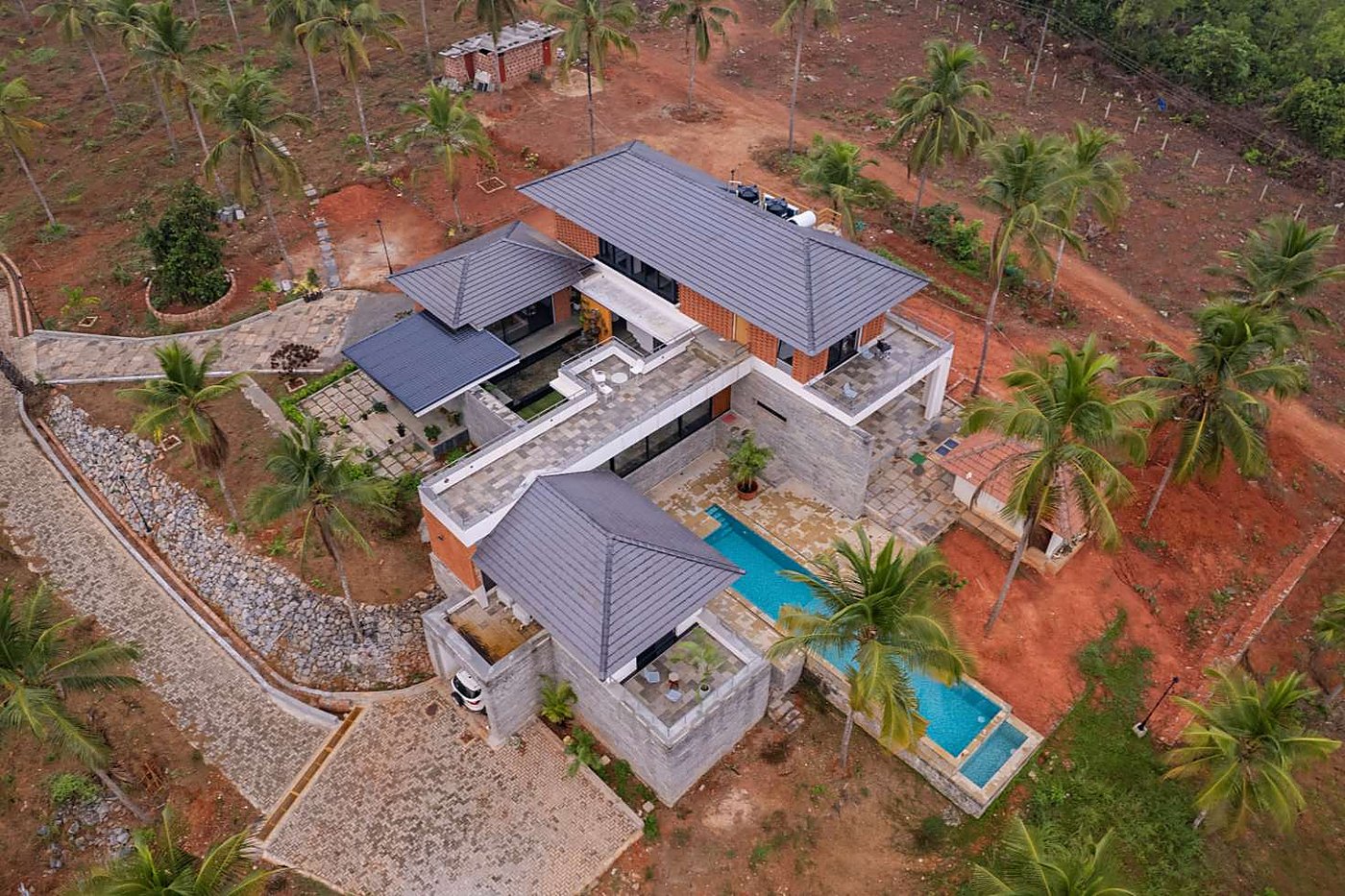 Aerial view of the house, courtyards and pool