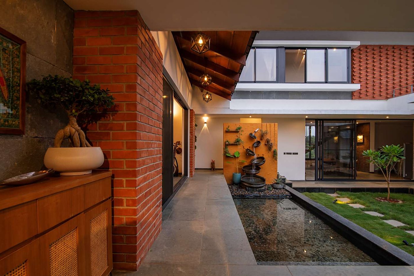 Internal courtyard with water feature and double-height volume