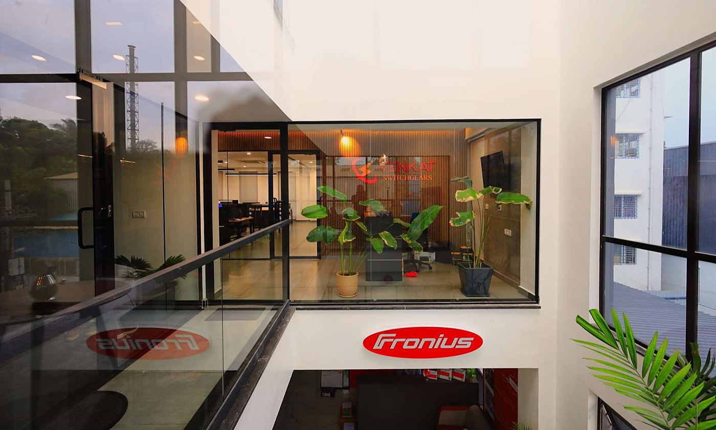 Atrium void seen from the upper level through glazing