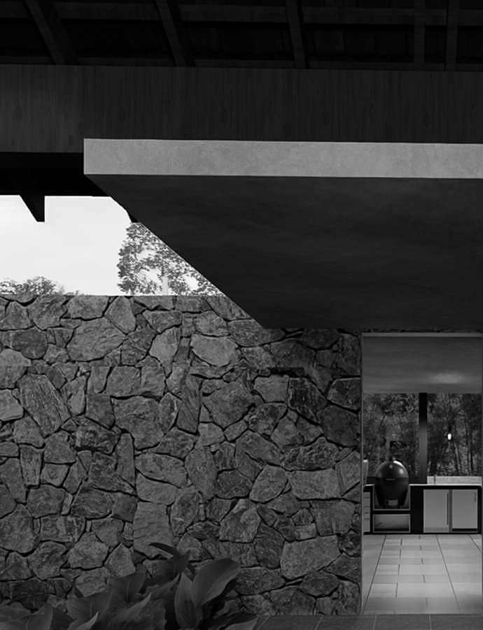 Stone-masonry wall and cantilevered slab framing the landscape